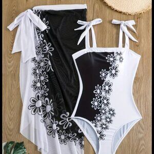 black and white swimsuit with coverup